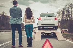 Couple waiting for tow truck