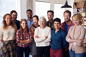 Group of employees standing together with group health insurance