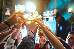 Group of friends clinking glasses