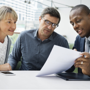 Couple studying E&O paperwork