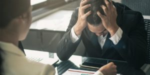 Business man needing errors and omissions insurance
