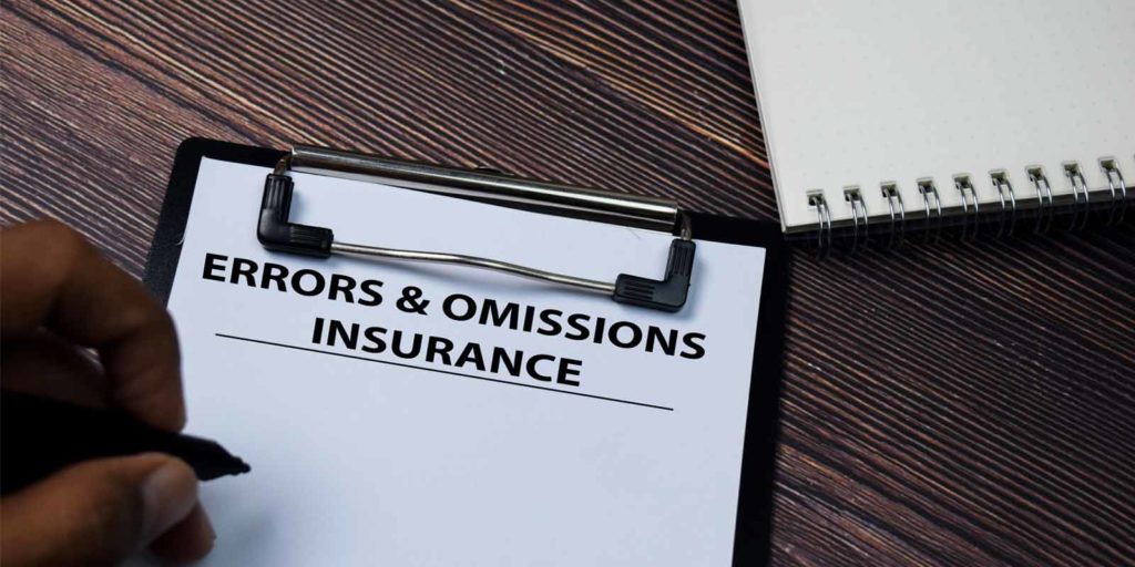 Errors and omissions insurance paperwork on desk