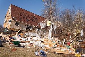 a home heavily damaged by a tornado needing Landlord Insurance