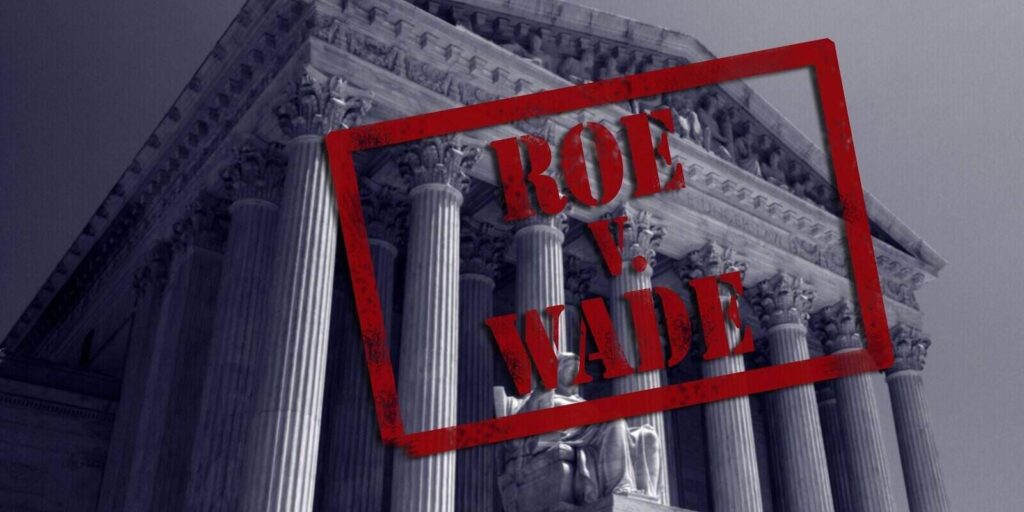 roe v wade stamp with the united states supreme court in background