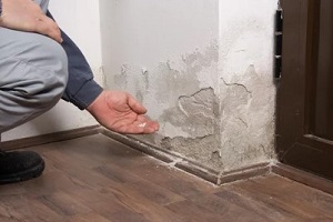 home wall damaged due to water