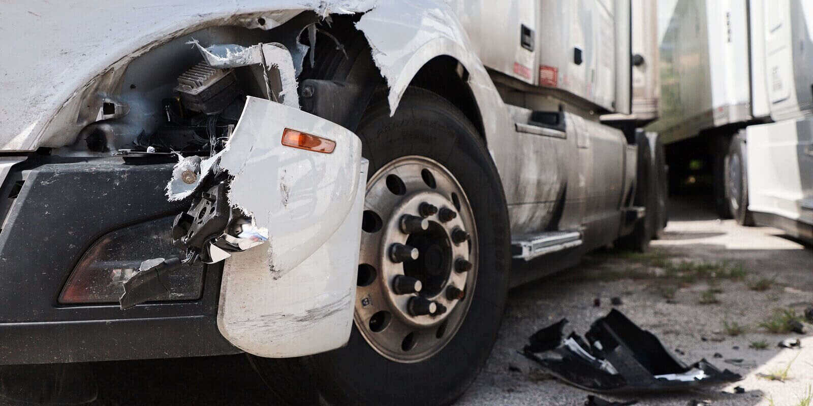 https://s33855.pcdn.co/wp-content/uploads/2022/11/damage-closeup-on-white-truck.jpg