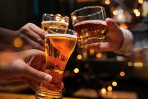 people holding beer glass