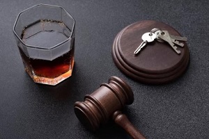 liquor glass with judge gavel