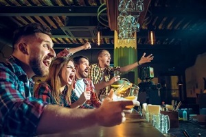 people enjoying in sports bar