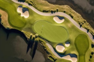 aerial drone view of golfers putting on moen island