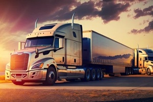 semi-trailer trucks parked at sunset sky