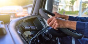 truck driver keeps driving with hands