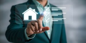 Man Checking Points for Commercial Insurance on Digital Checklist