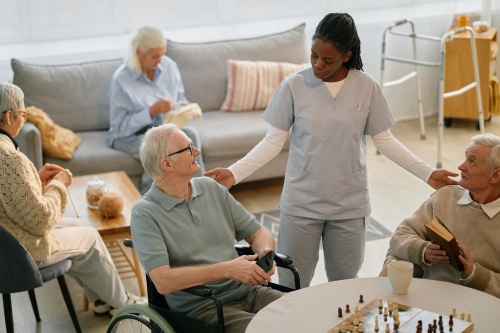 Room of seniors playing games at an assisted living facility