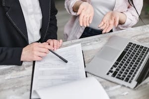 Assisted Living Directors Discussing Professional Liability Coverage