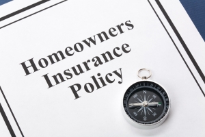 Homeowners Insurance Policy Written on A White Paper